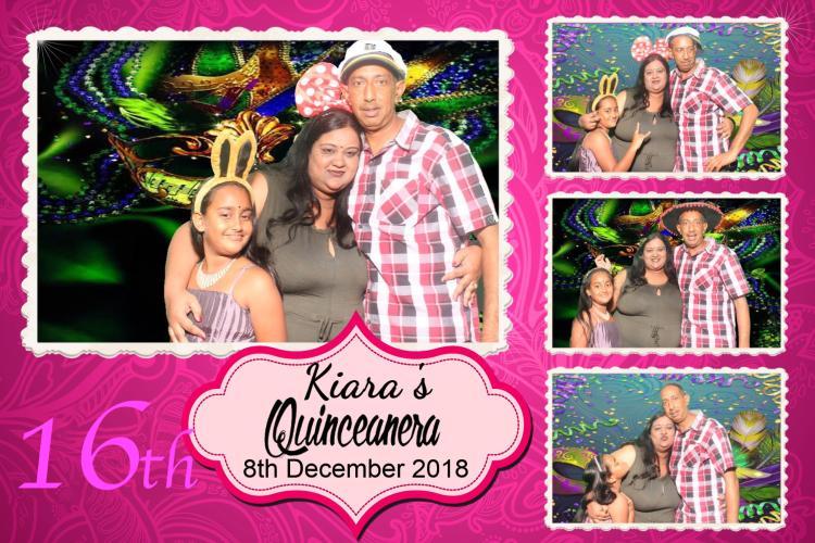 Bright birthday photo booth layout with themed backgrounds and props